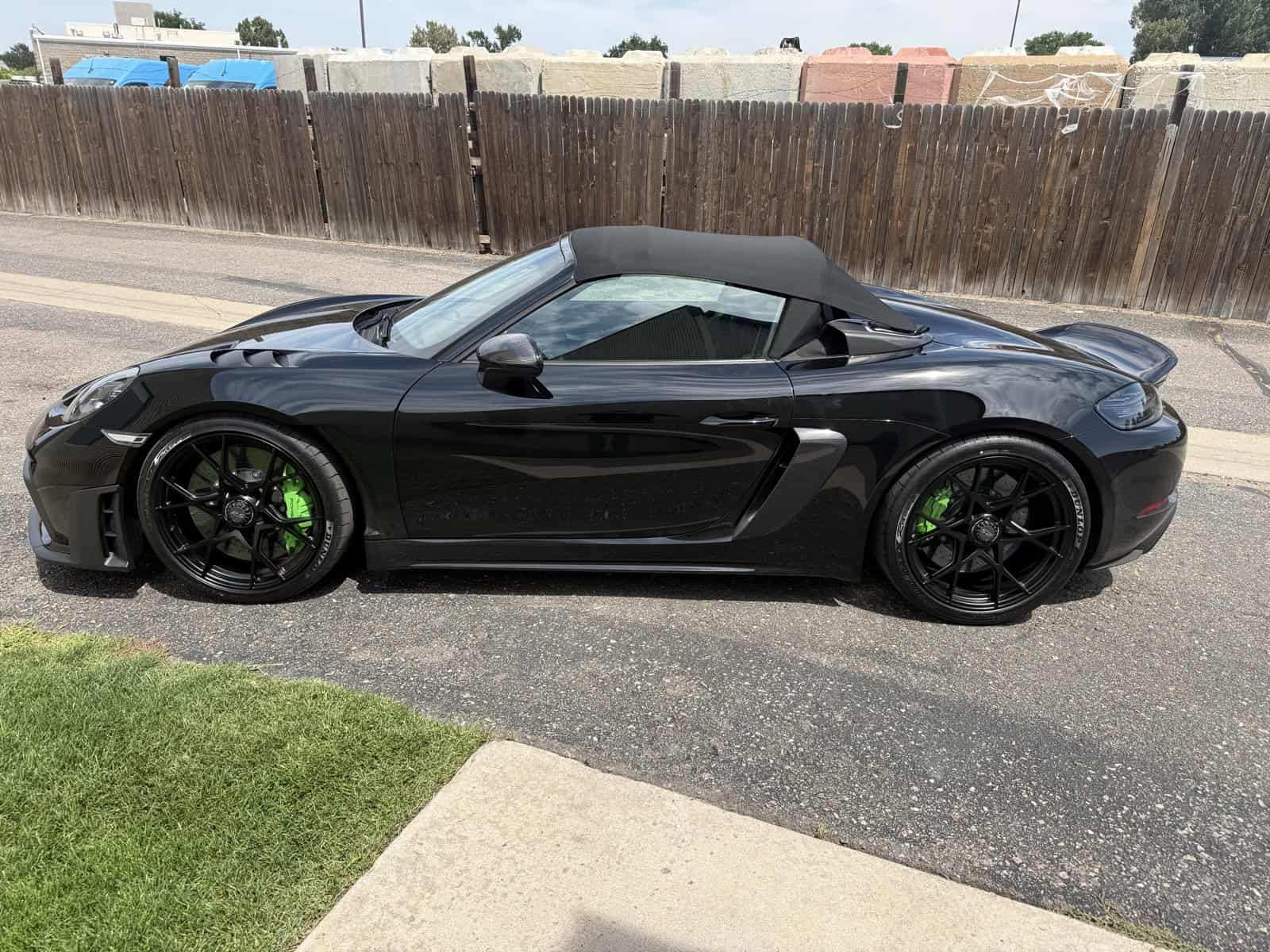 Black Porsche 718 with green powder coated brake calipers by ColorWerks Denver