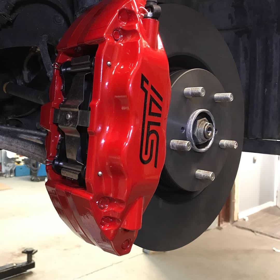 Red STI brake caliper powder coated Denver