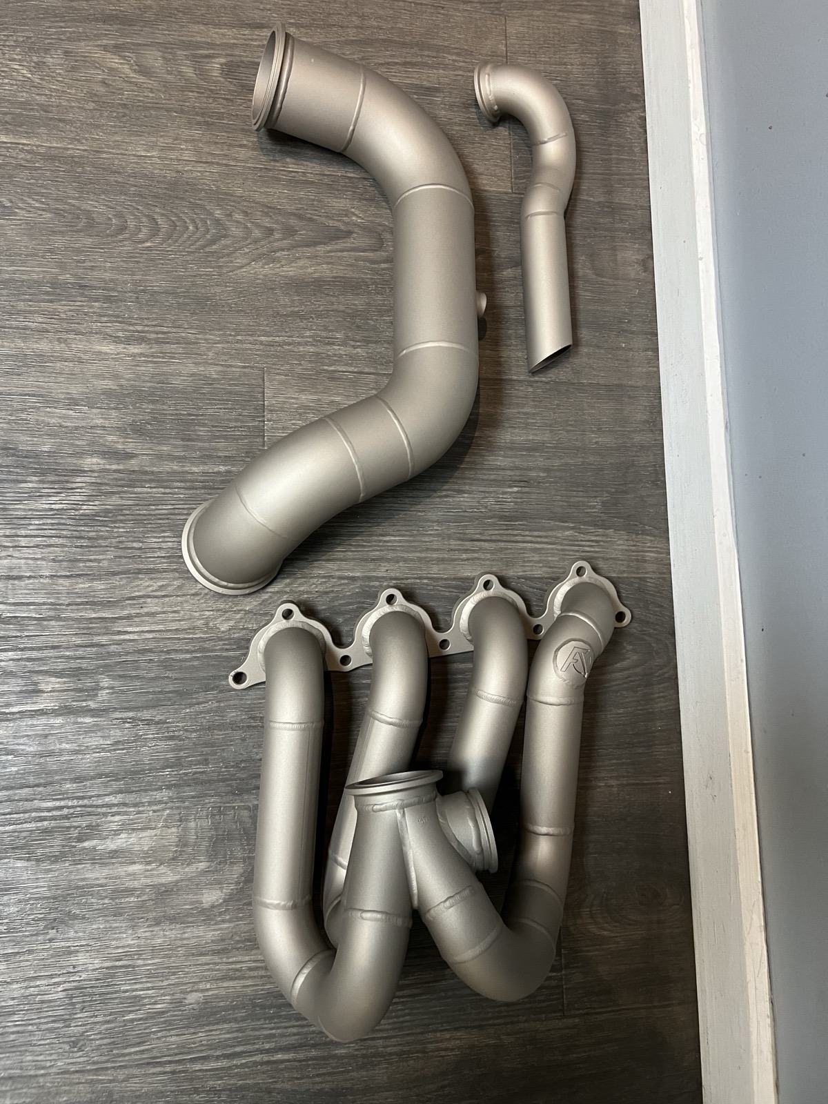 Silver titanium exhaust manifold Cerakote Denver