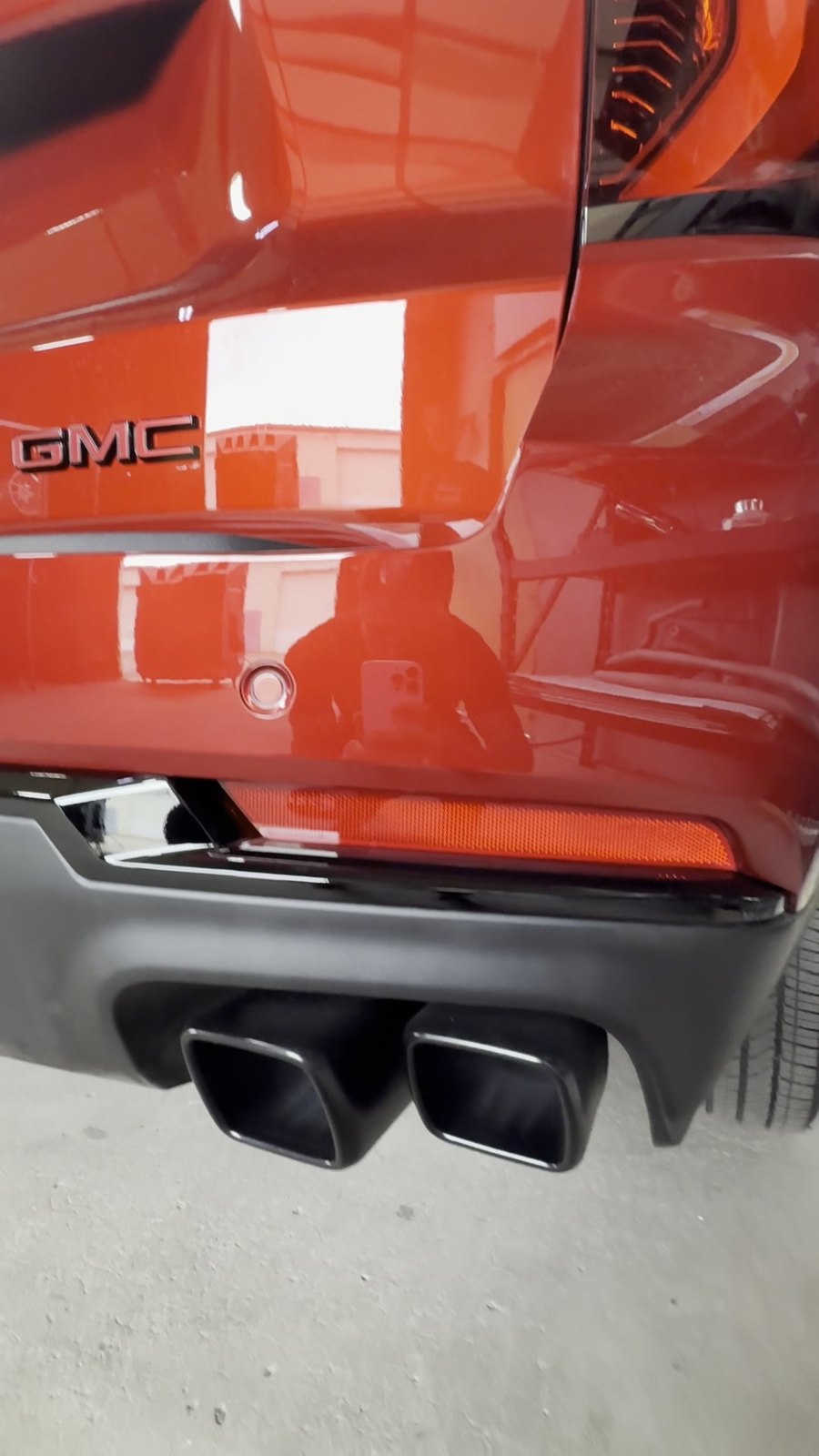 AFTER: GMC Sierra black exhaust tips and gloss black GMC badge, Denver