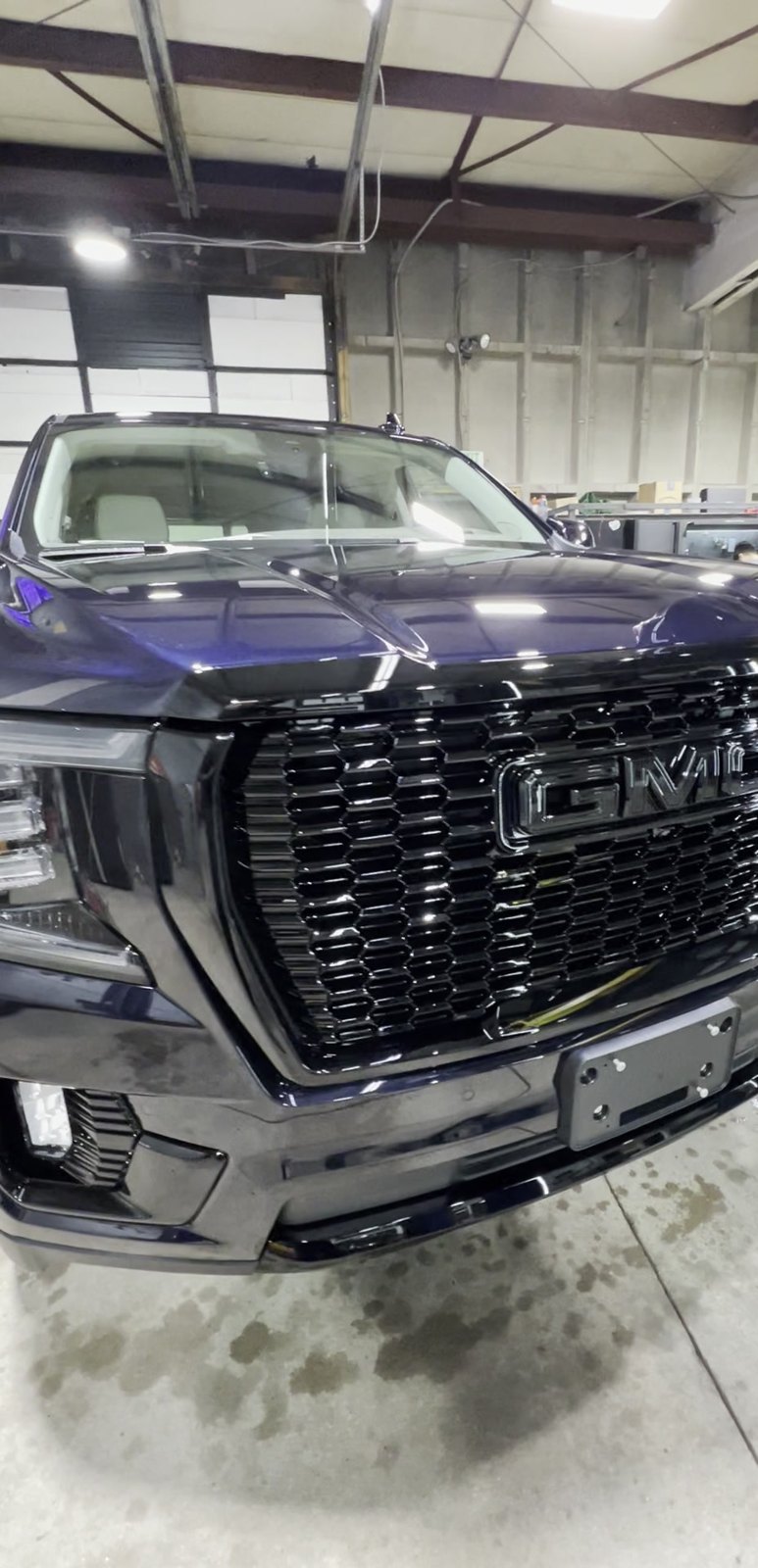 AFTER: GMC Yukon chrome delete, gloss black grille and badges, Denver