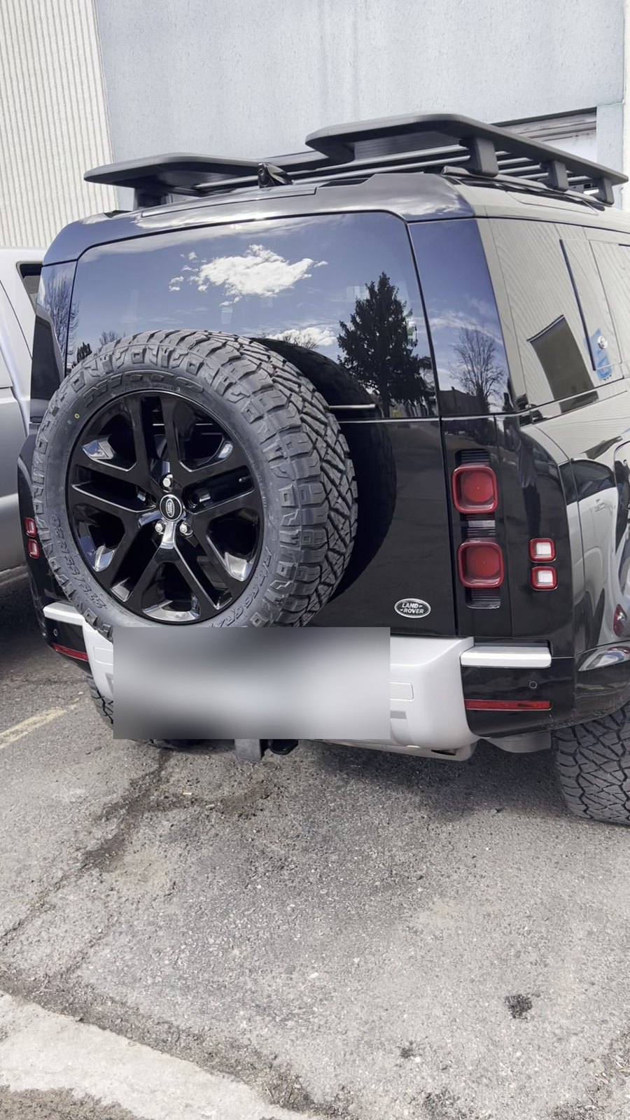 AFTER: Land Rover Defender blacked-out roof rails and black wheels, Denver