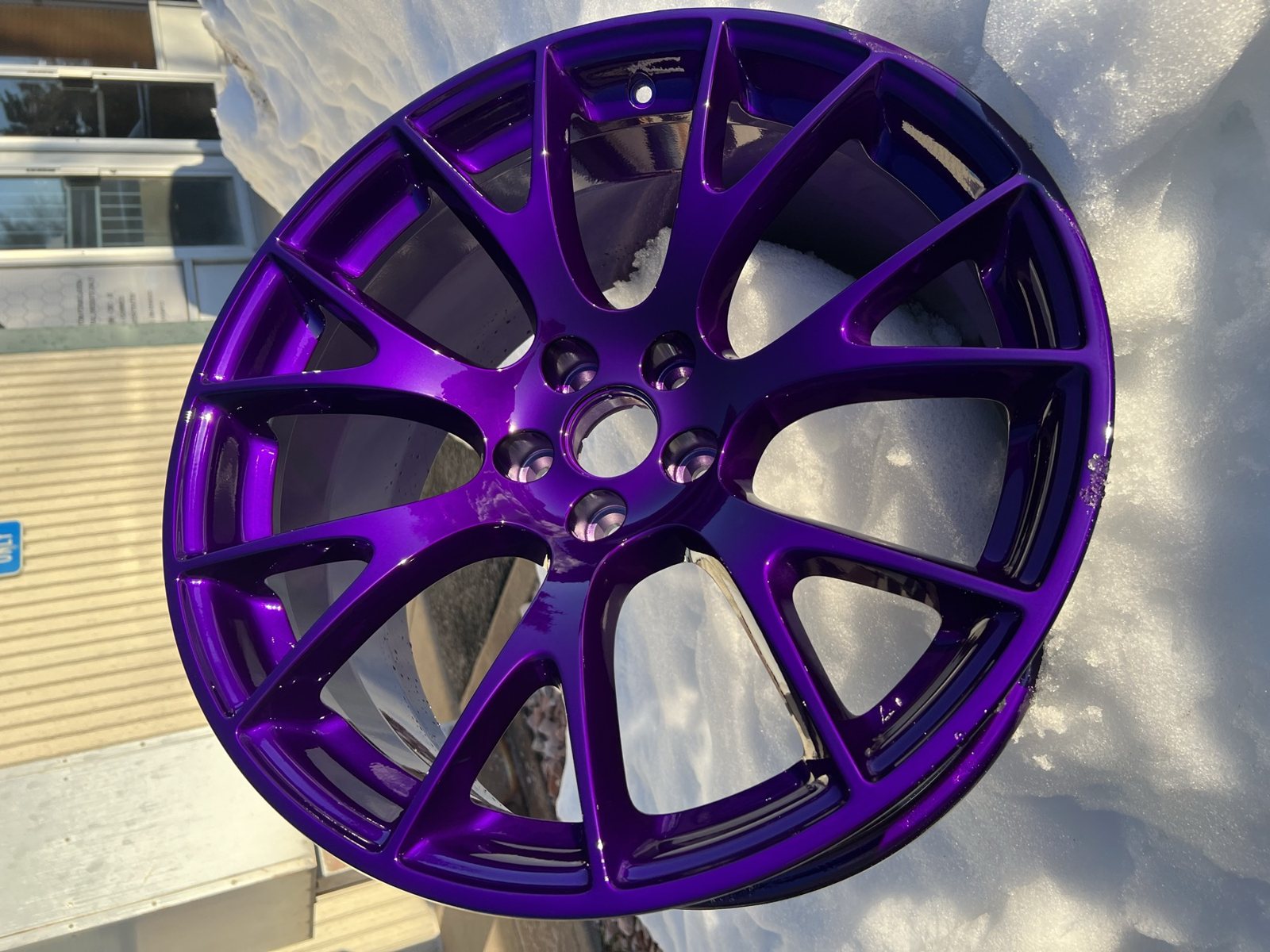 Purple powder coated wheels on a Dodge Challenger
