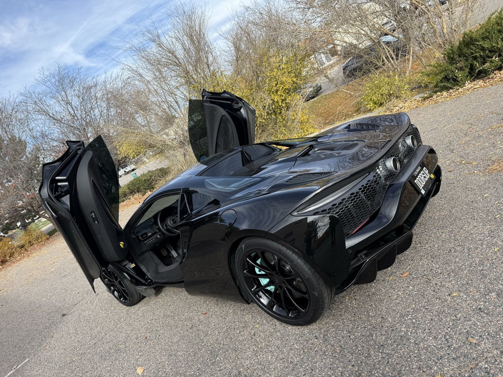 Gloss black powder coated wheels on a McLaren 720S at ColorWerks in Denver