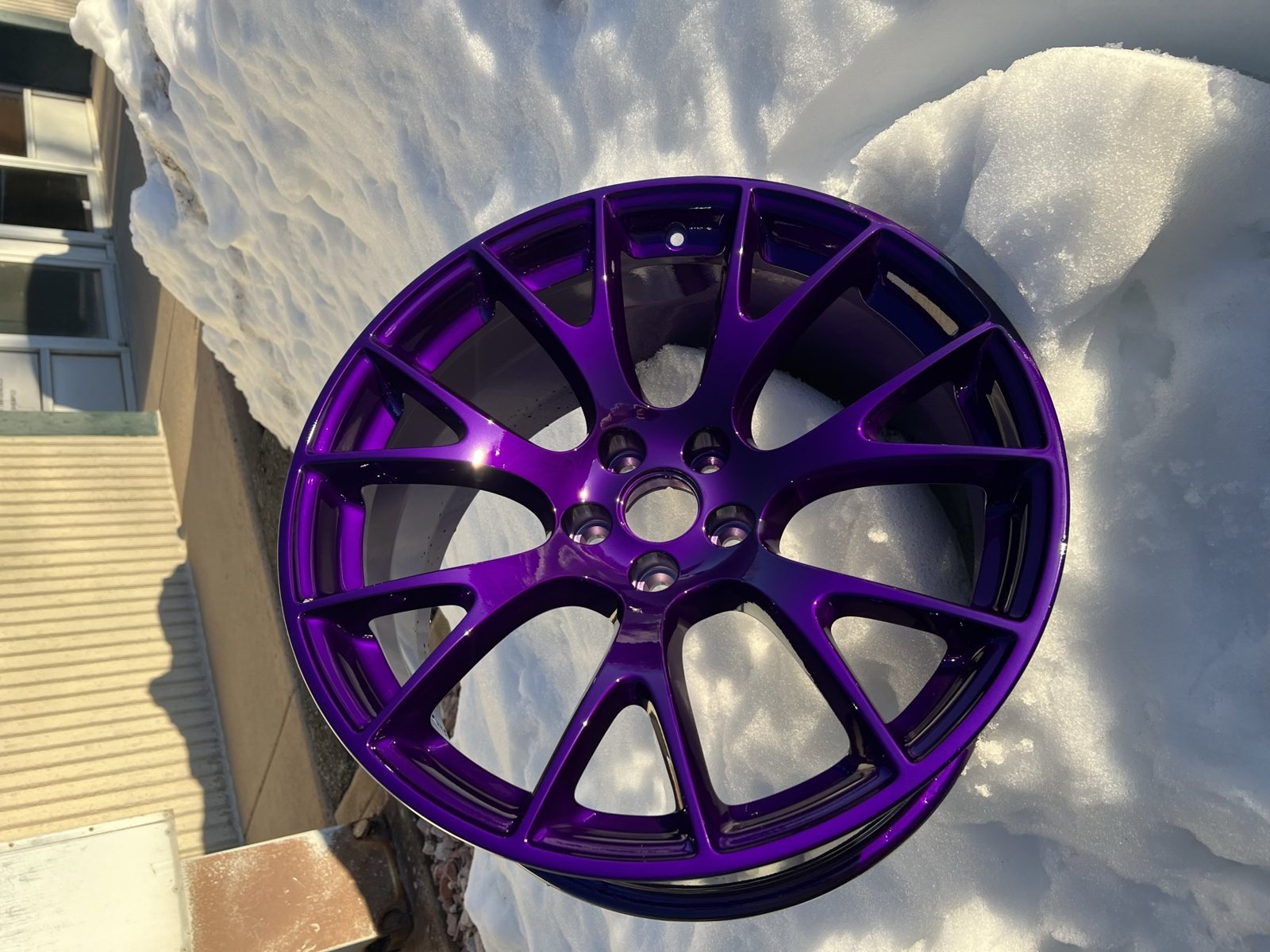 Metallic purple powder coated wheel