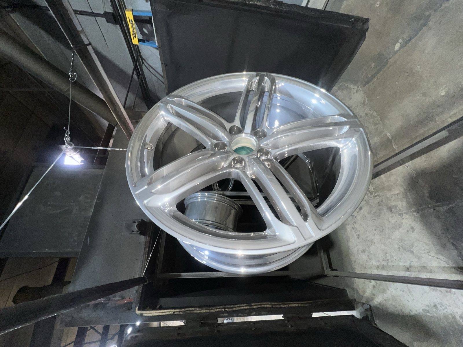 Metallic silver powder coated wheel