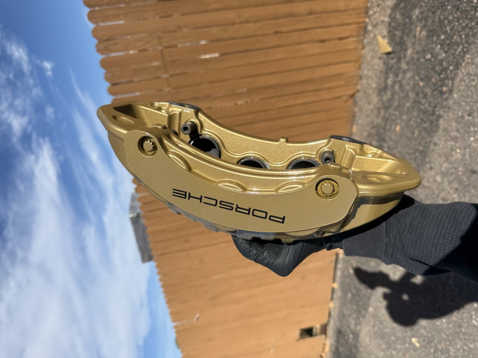 Gold powder coated Porsche brake calipers