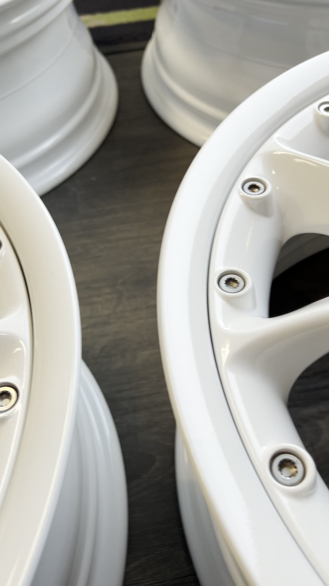 Gloss white multi-piece wheels after powder coating